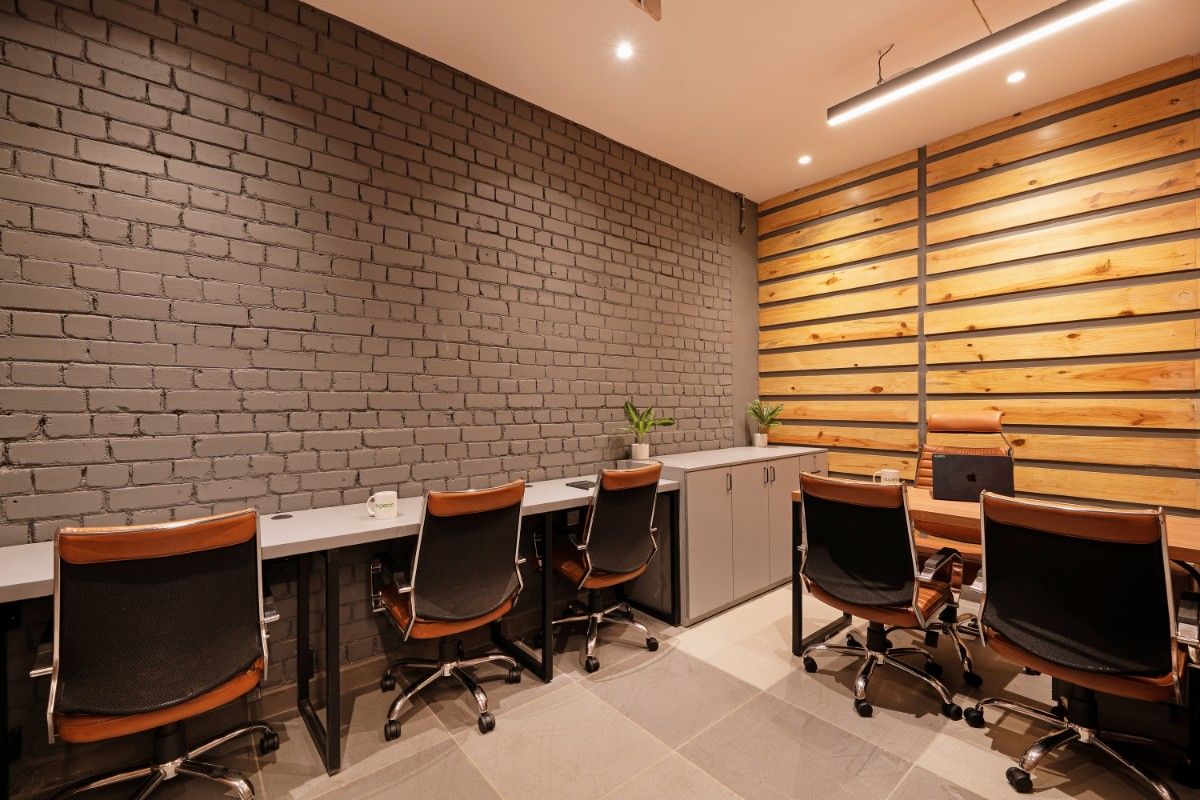 Modern coworking desk setup in Greater Noida office space.