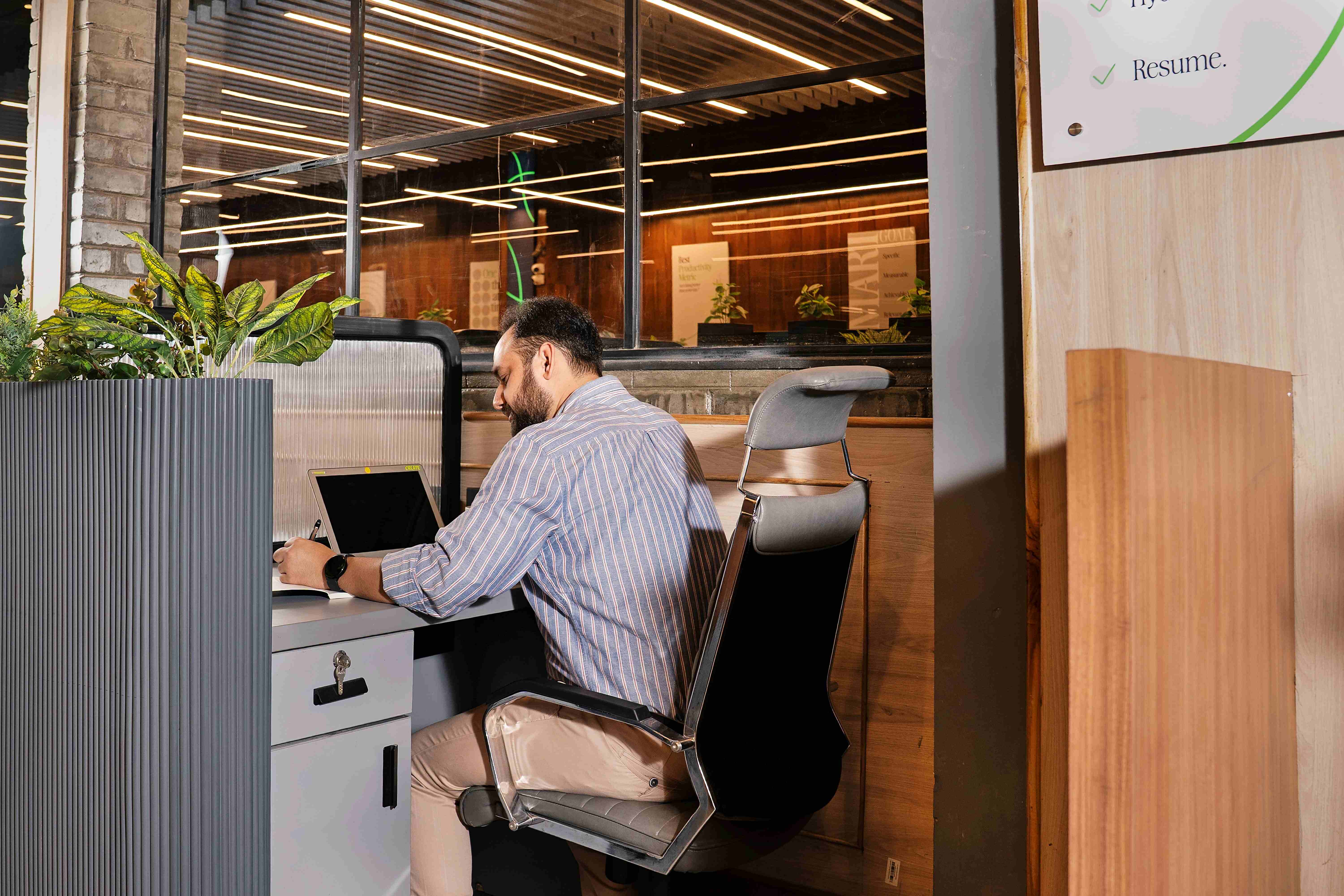 Private desk in a modern coworking workspace.